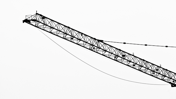 a black and white photo of a power line