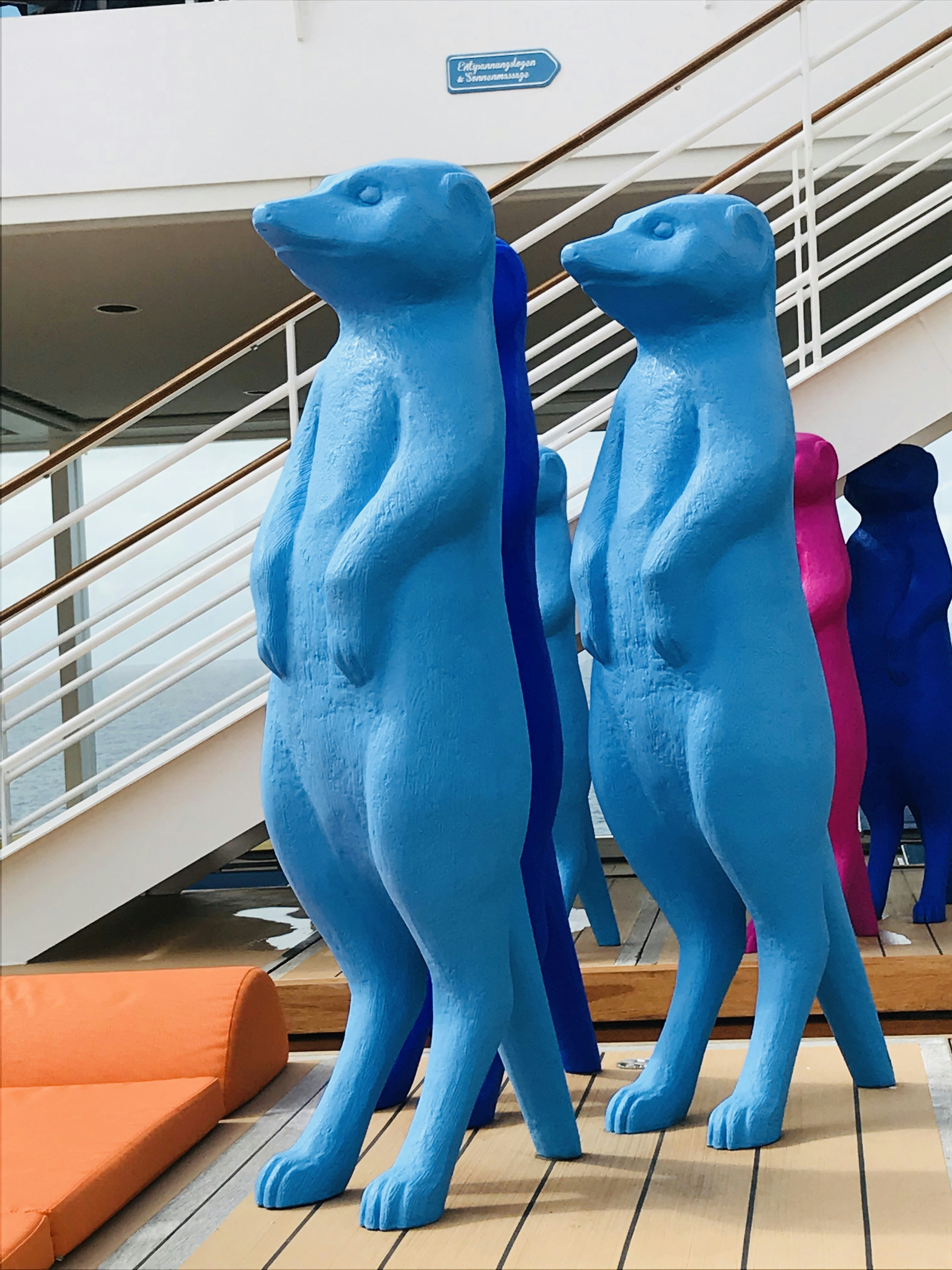 a couple of blue bears standing next to each other