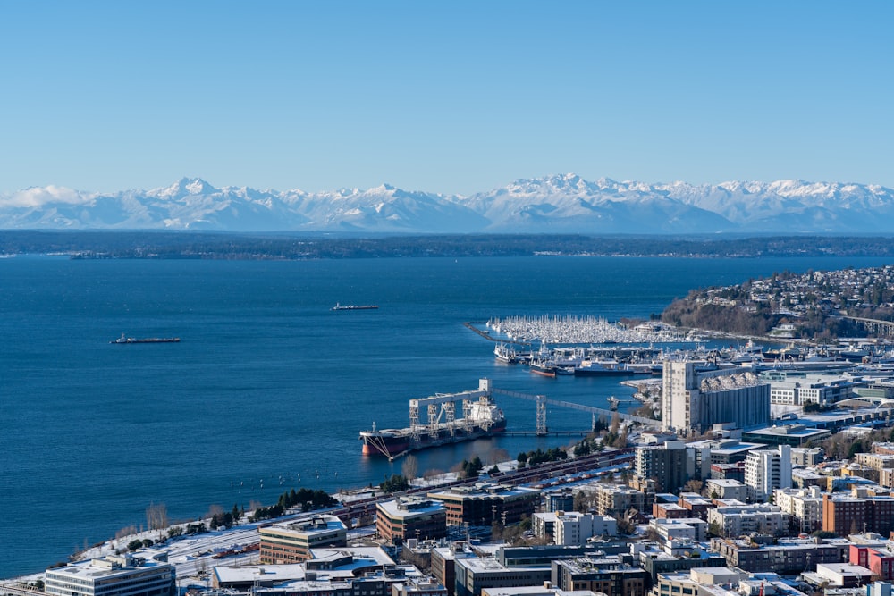 a view of a city with mountains in the background