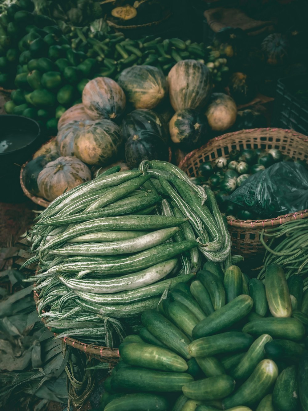 a pile of green vegetables sitting next to each other