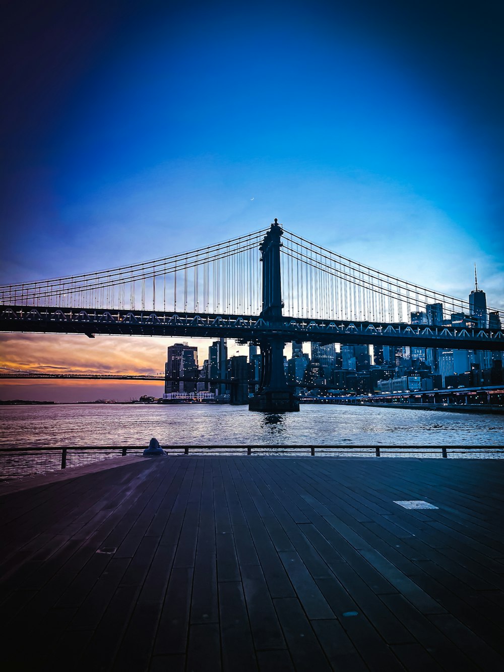 a large bridge spanning over a large body of water