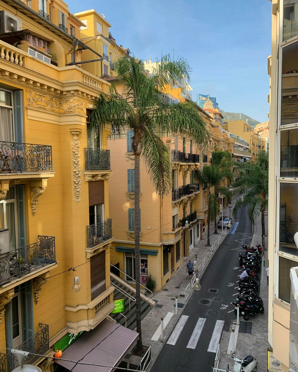 a view of a city street from a balcony