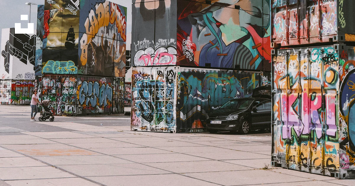 A bunch of boxes that are on the side of a building photo – Free ...