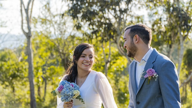 a man and a woman standing next to each other