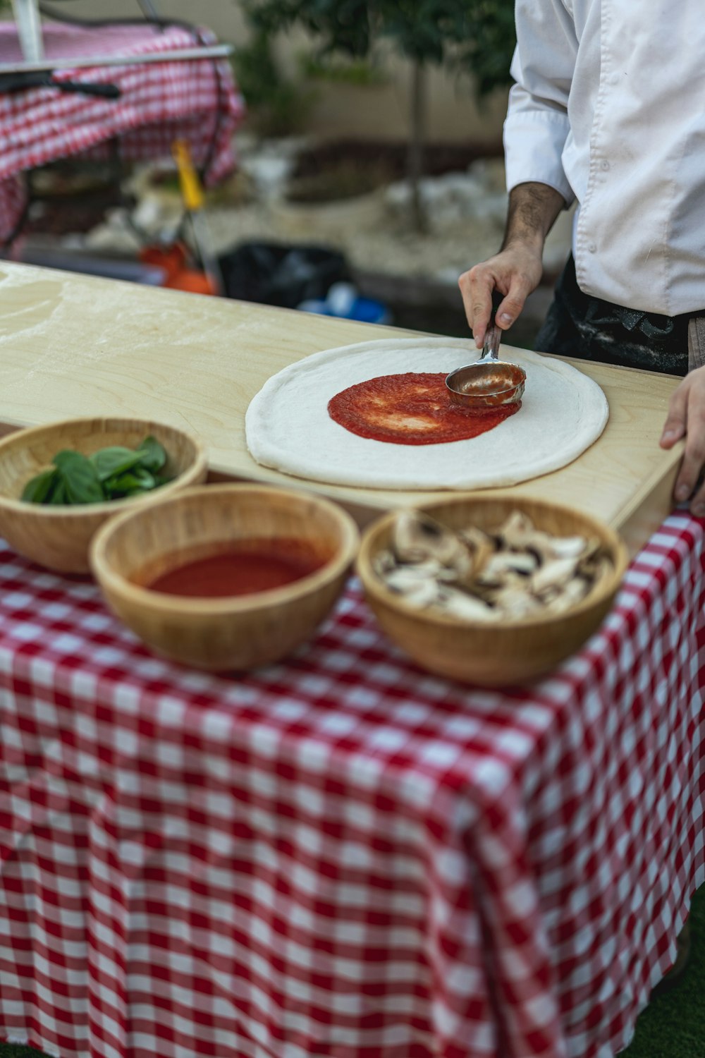 a man is preparing food on a table