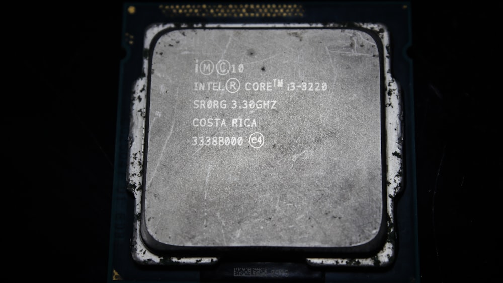 a close up of a cpu on a black surface