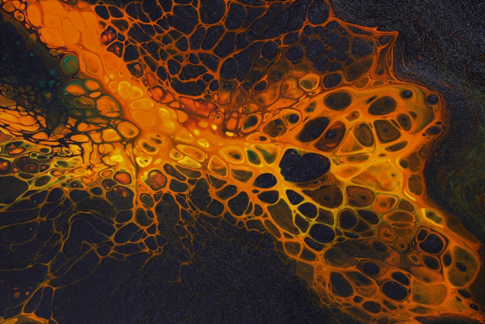 a close up of a black and yellow substance