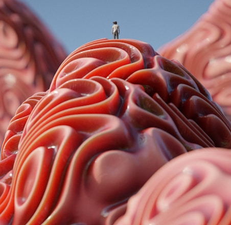 a person standing on top of a giant pink object