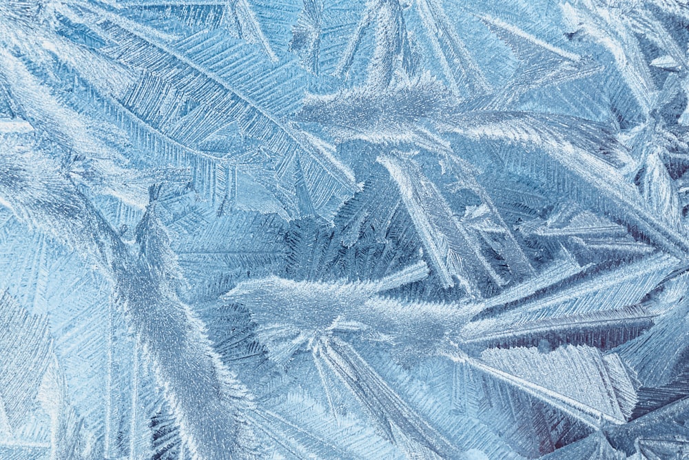 a close up view of a frosty window