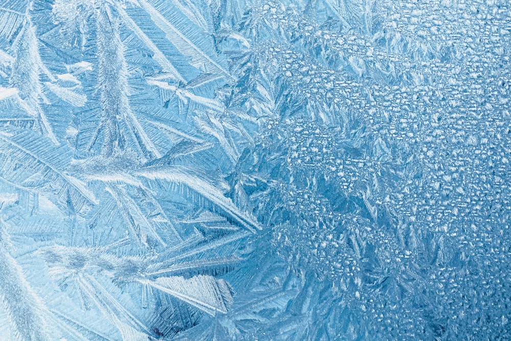 a close up view of a frosty window