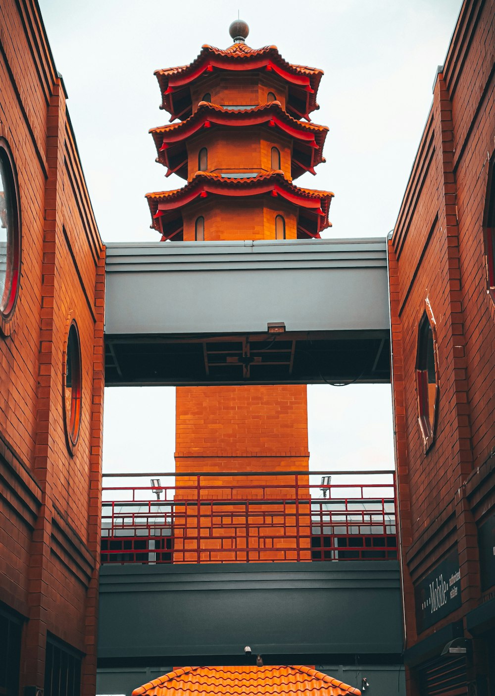 a tall tower with a clock on top of it