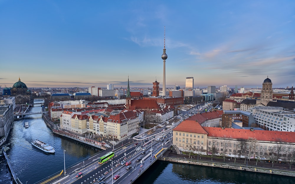 a view of a city with a bridge in the foreground