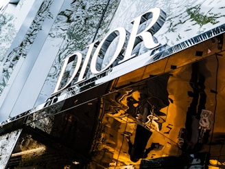 a reflection of a building in the windows of another building