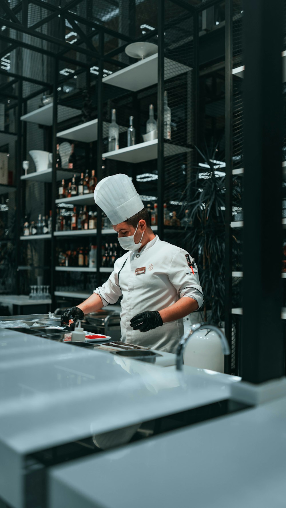 a man in a chef's hat is cooking in a kitchen