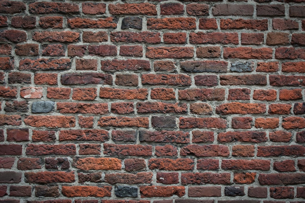 a brick wall made of red bricks
