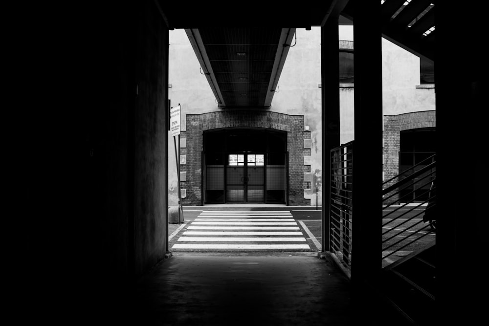 a black and white photo of a hallway