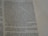 A close-up view of an open book page with printed text in English. The focus is on a particular section of text on the left, while the right side displays blank lines for note-taking.