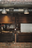 A cozy kitchen with warm lighting and rustic elements.