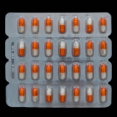 a close up of a contraption filled with pills