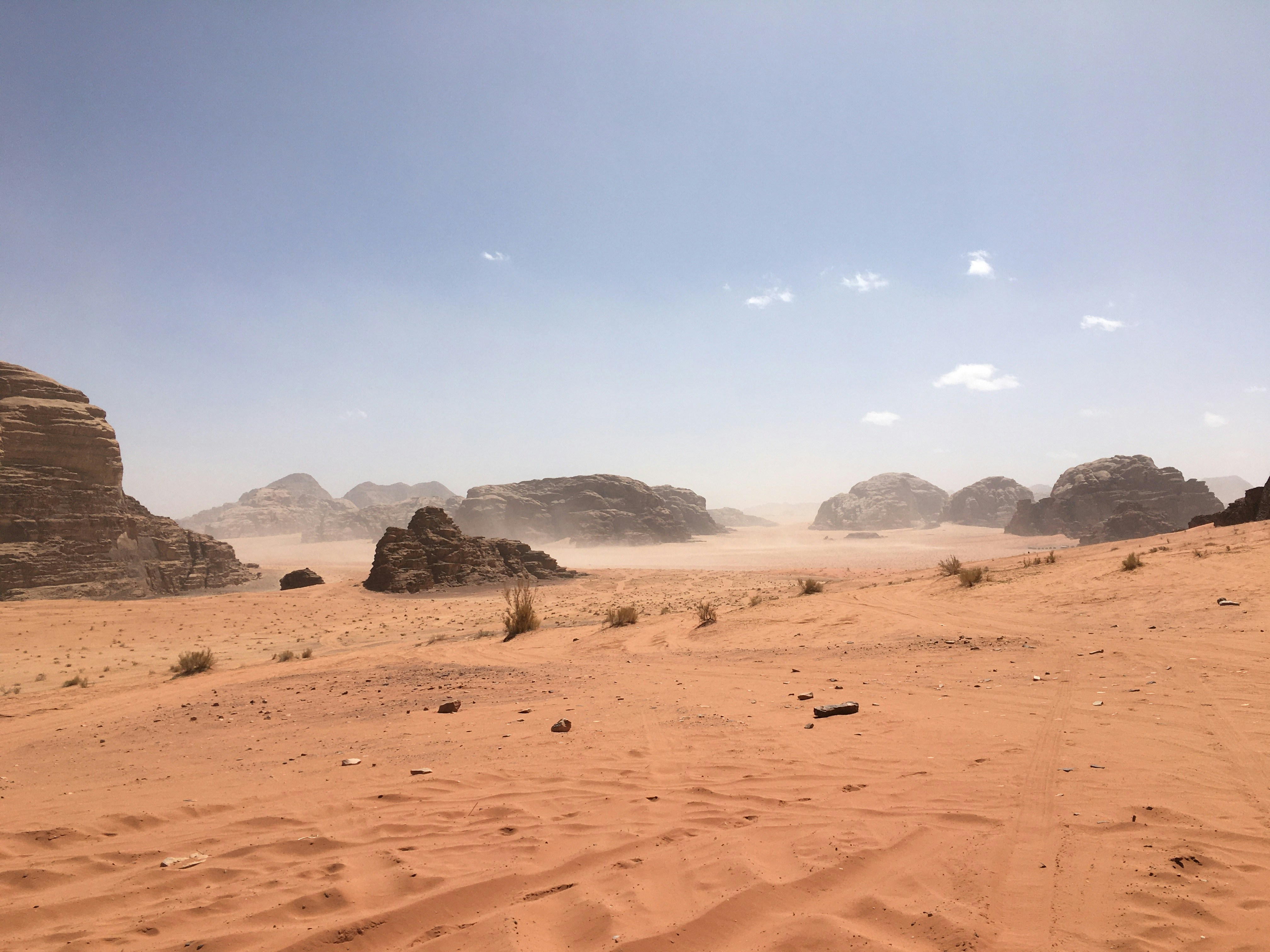 The red desert keeps its secret, traces are covered by the wind to reinvent each day., trying to navigate between the dunes and the rocks. Magical!