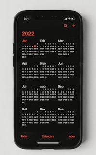 A vibrant digital calendar layout displayed on a modern device screen