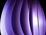 Depth-rich 3D layered glassmorphic panels with subtle gold gradients and soft glows.