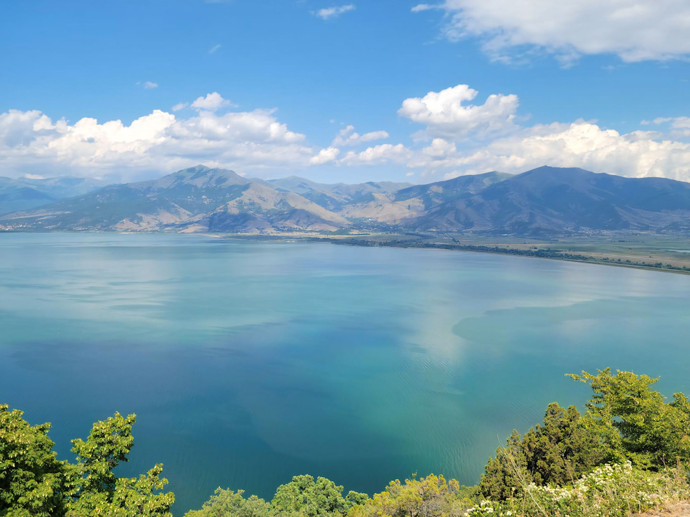 a large body of water surrounded by mountains