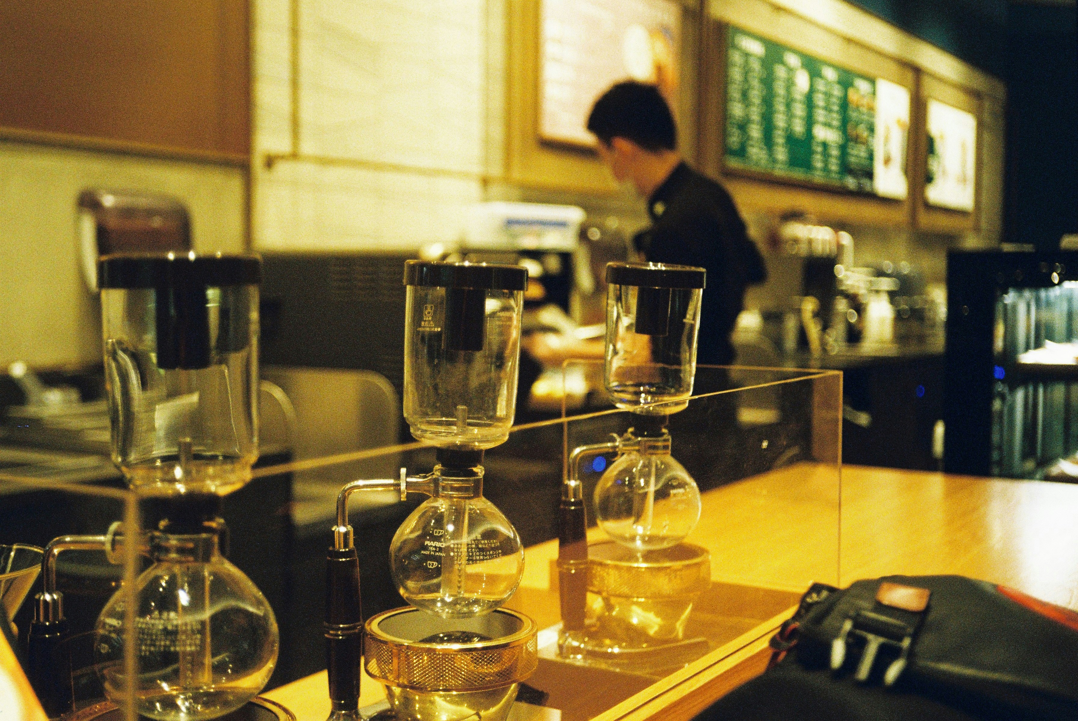 a counter with a lot of glasses on it