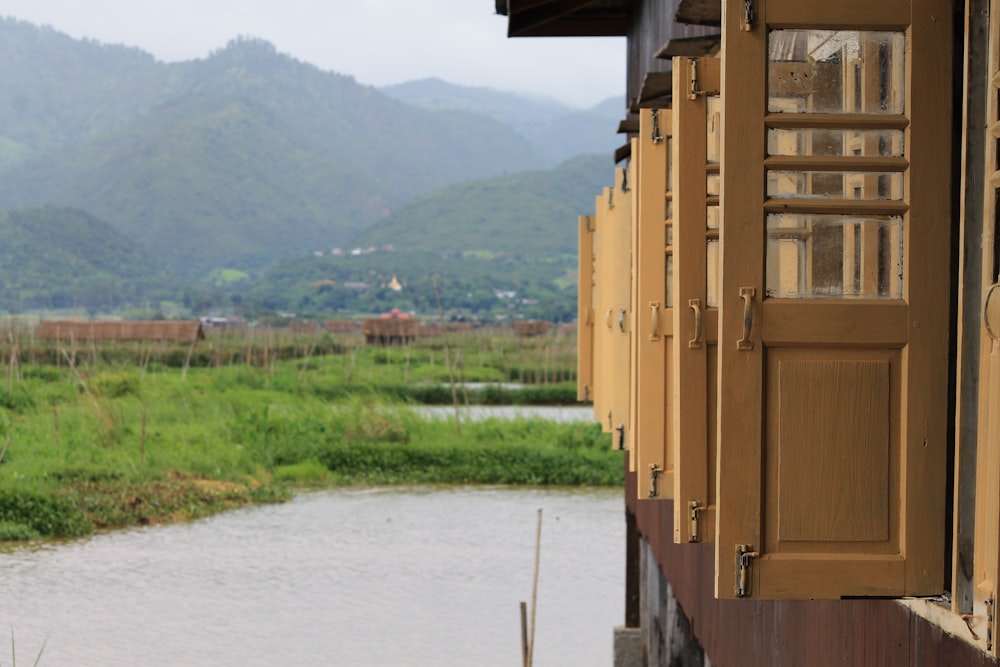 a view of a body of water with mountains in the background