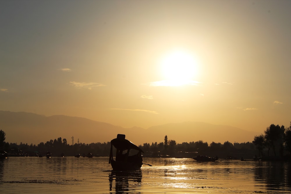 a person in a boat on a body of water