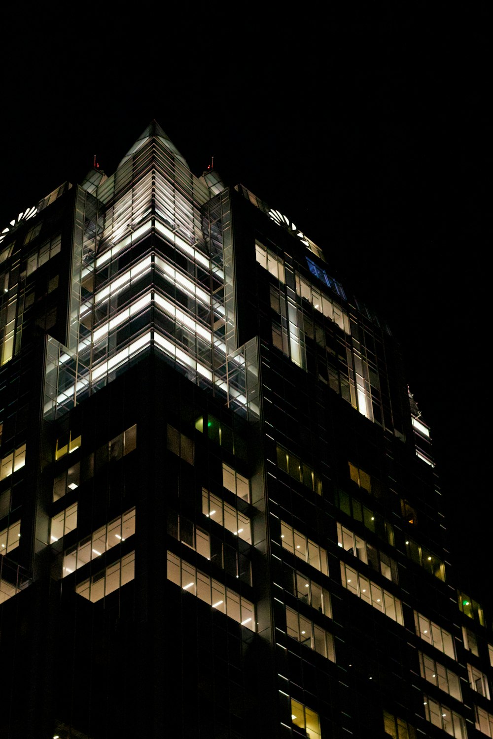 a very tall building lit up at night