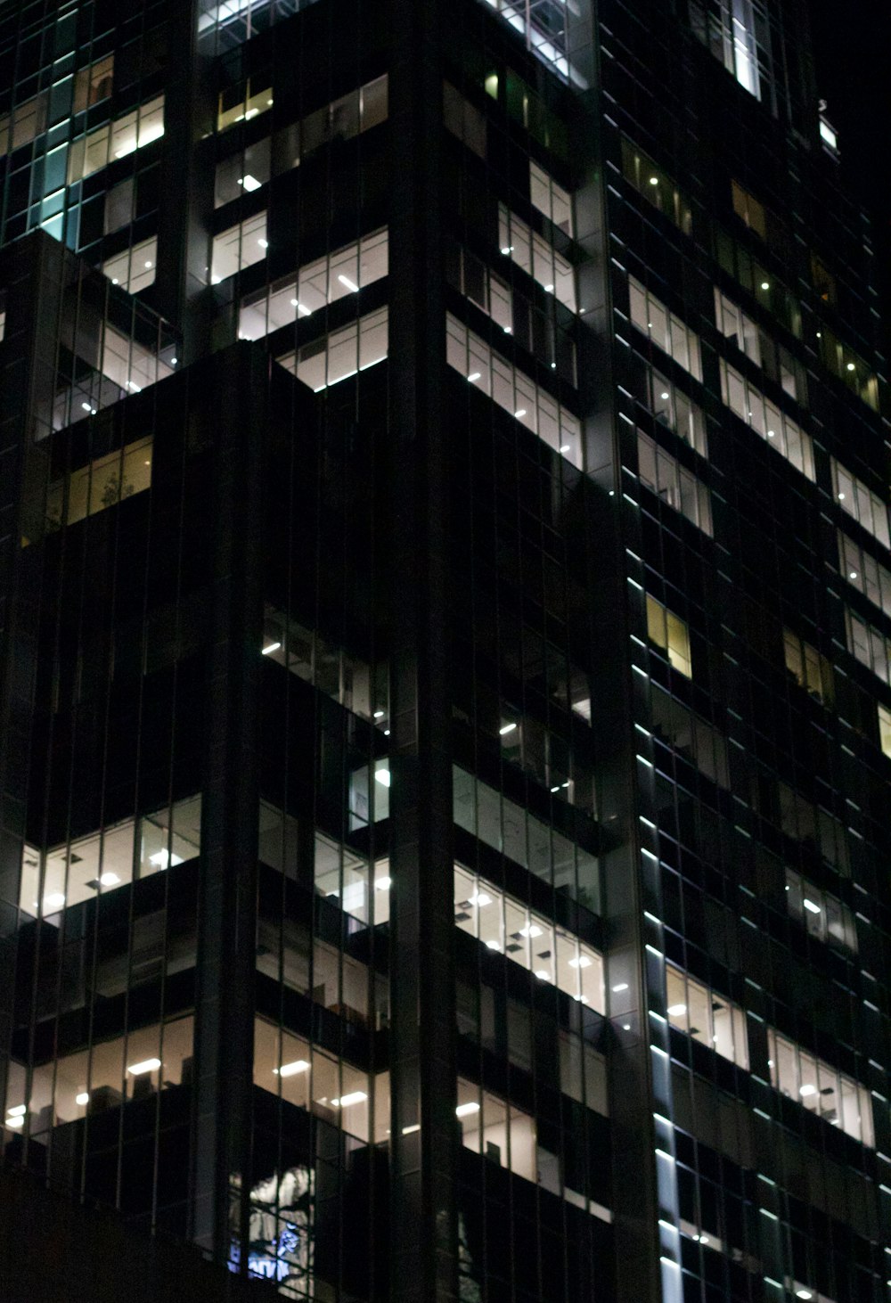 a very tall building lit up at night