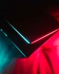 3D scanner emitting blue neon light scanning a futuristic object