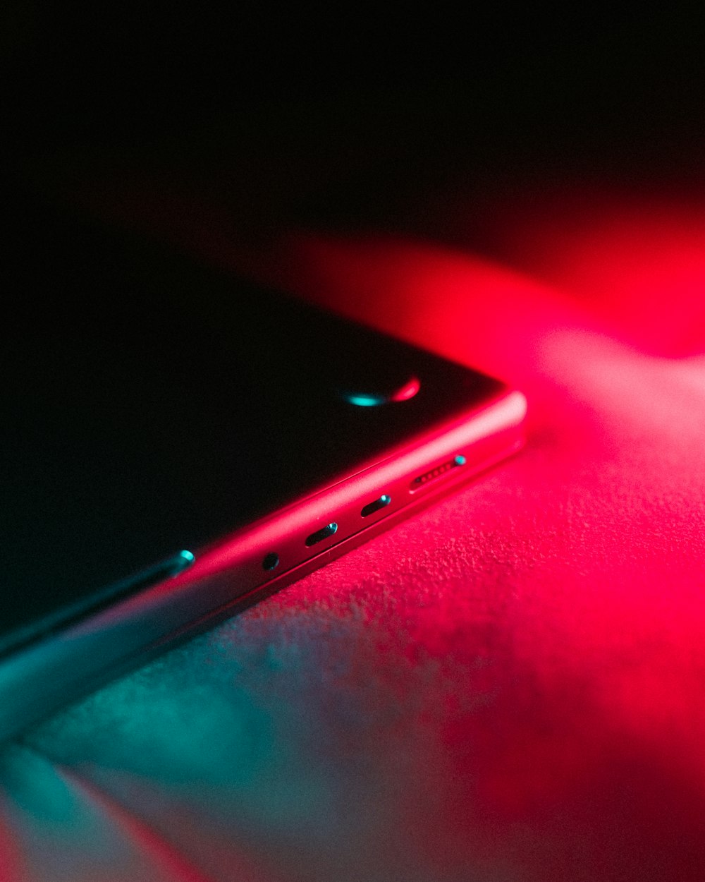 a close up of a cell phone on a table