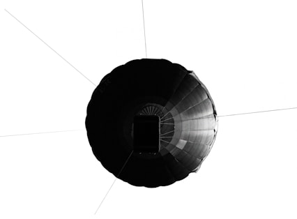 a black and white photo of a hot air balloon