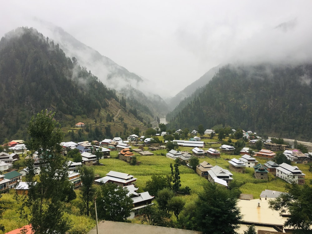 a village in the middle of a mountain range