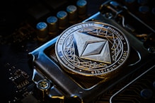 a close up of a metal object on a motherboard