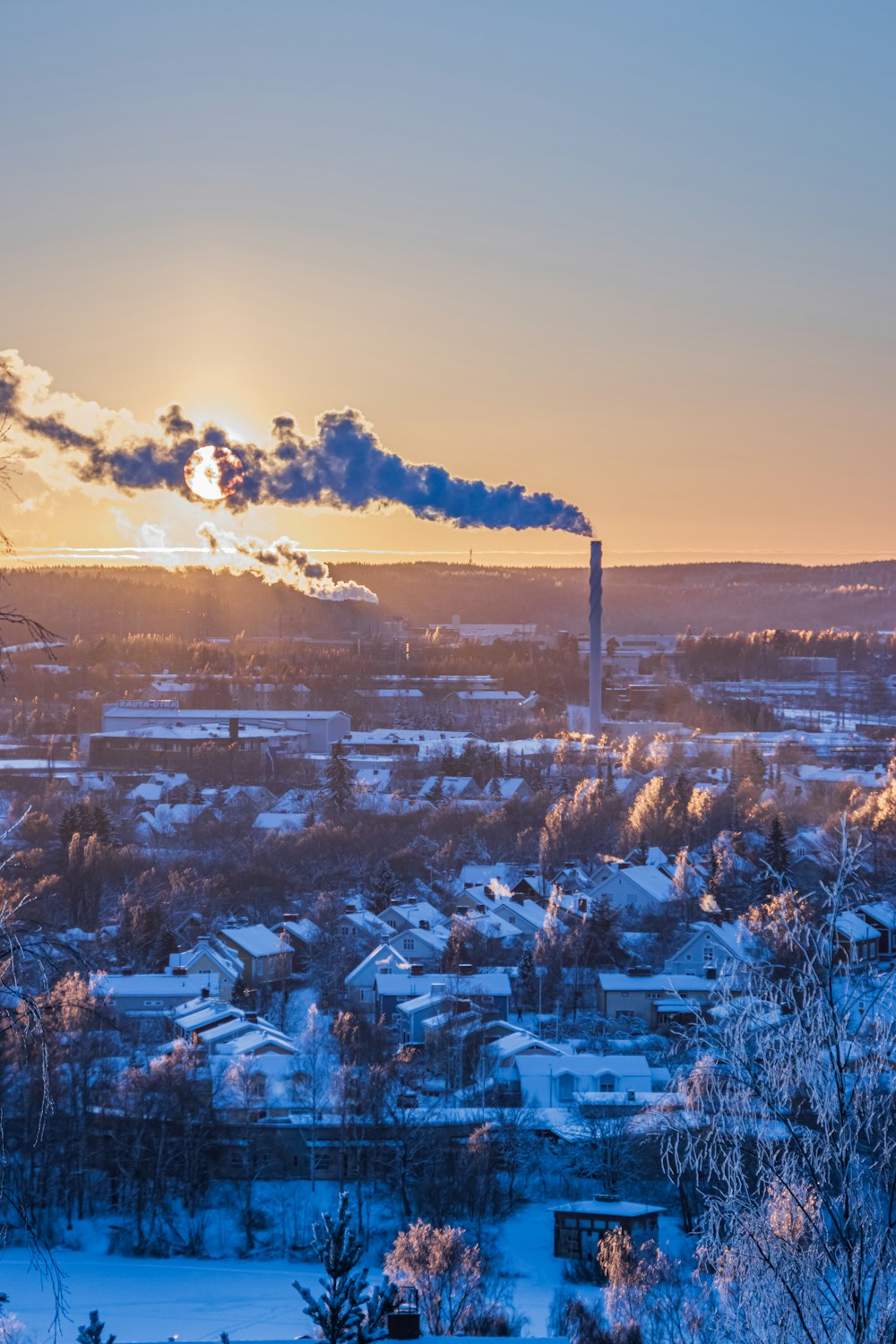 a factory with smoke coming out of it