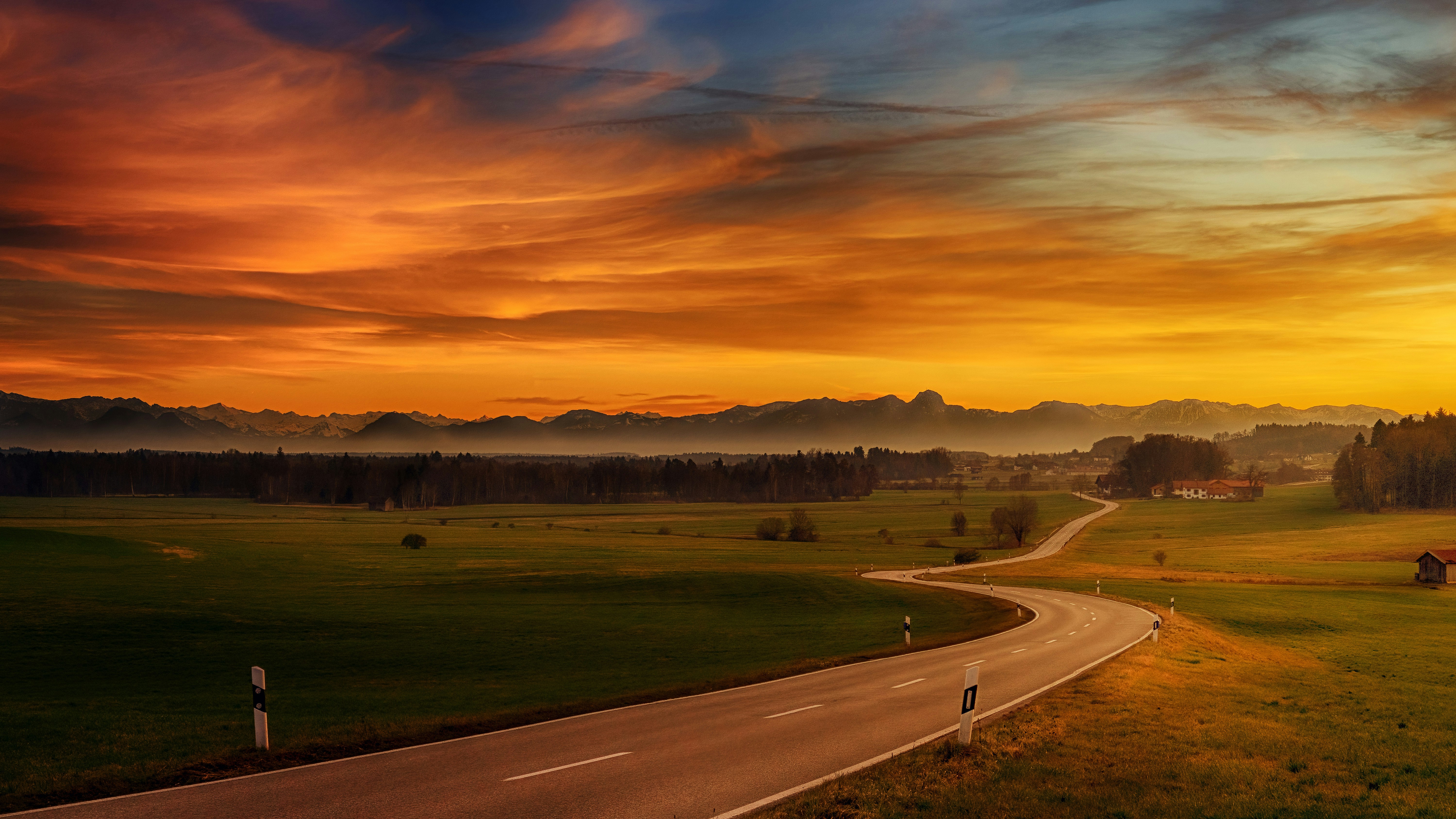 A road in the middle of a green field photo – Free Nature Image on Unsplash