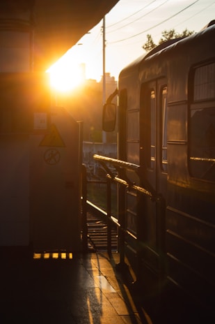 Sunset view with a taxi waiting at the SGR station, ready for the next trip.