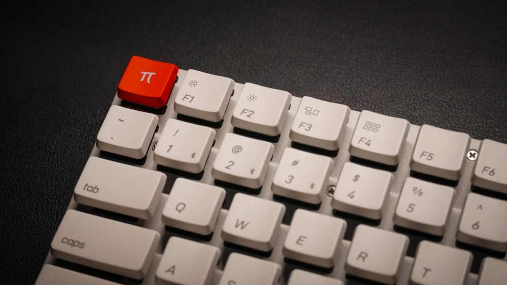 a close up of a red and white keyboard