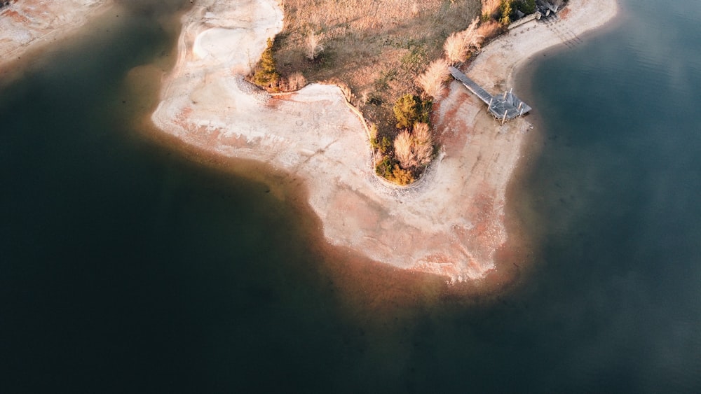 an aerial view of an island in the middle of the ocean