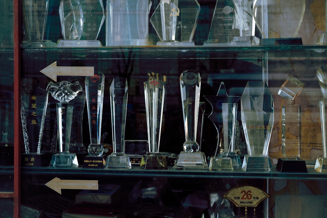 a crowded, old-fashioned glass trophy case - Trophy Display Touchscreen a crowded, old-fashioned glass trophy case - Trophy Display Touchscreen