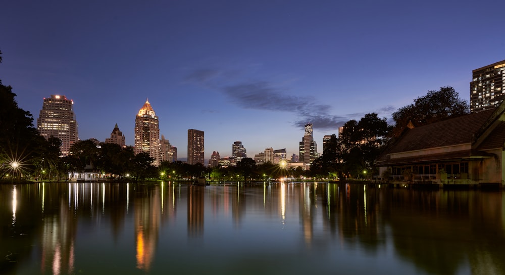 a view of a city at night from across a lake