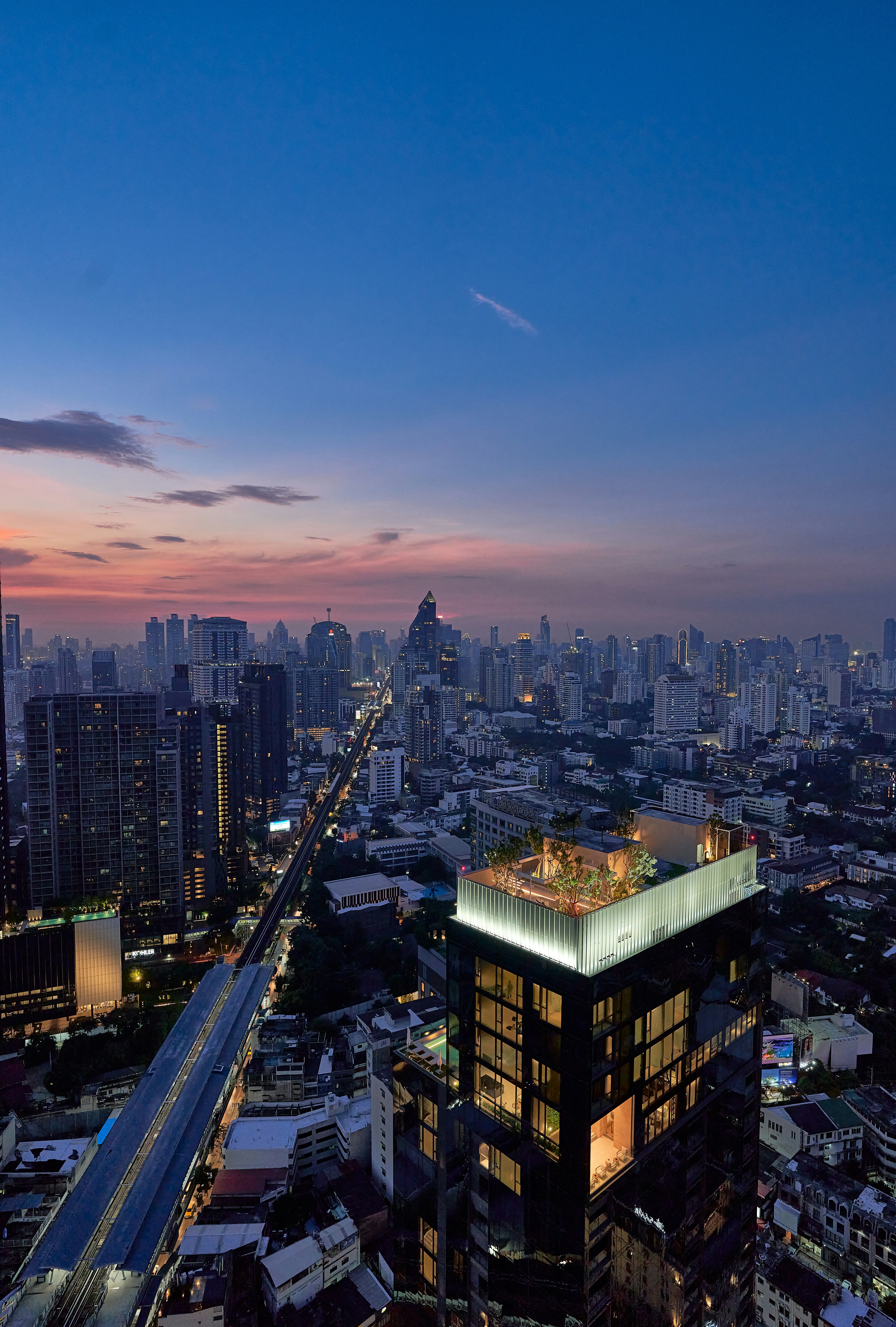 an aerial view of a city at night