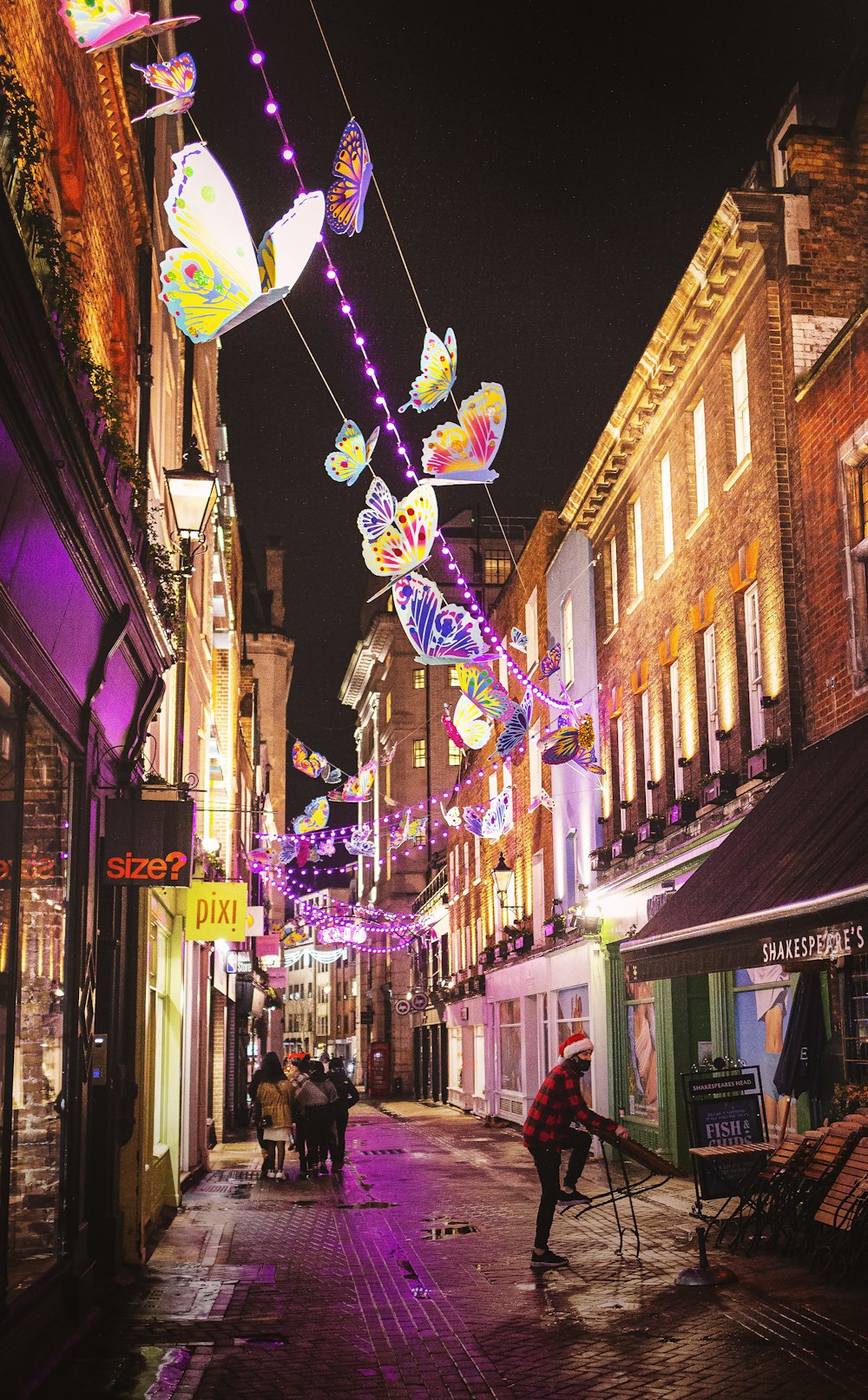 a street filled with lots of colorful lights