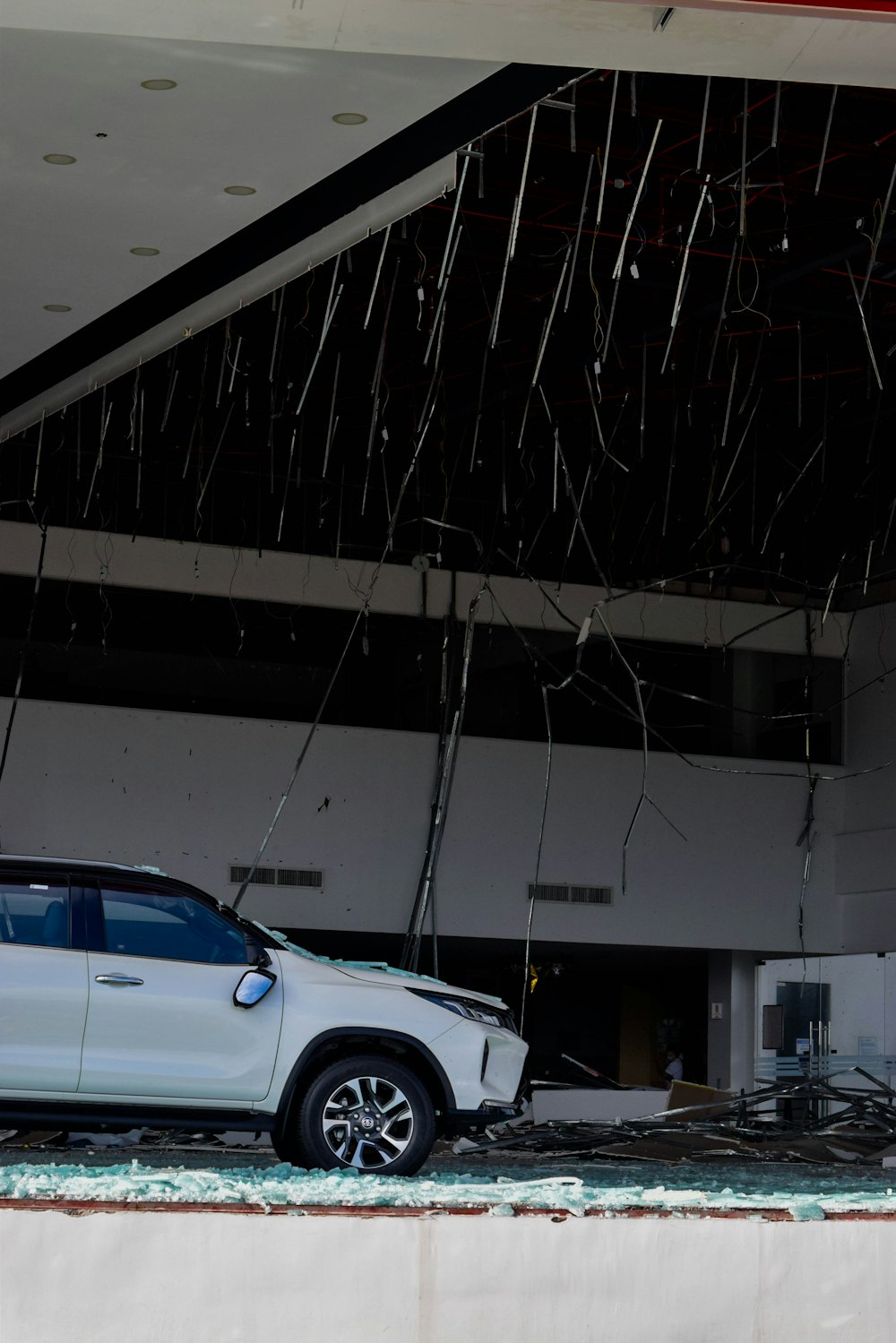 a white truck parked in front of a building