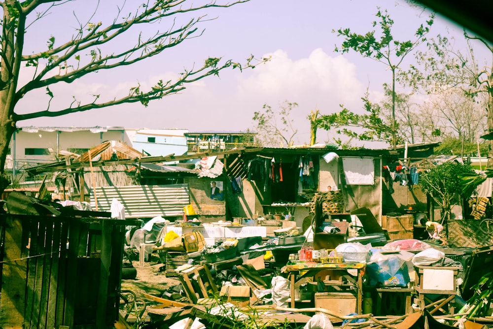 a bunch of junk is piled up in a yard