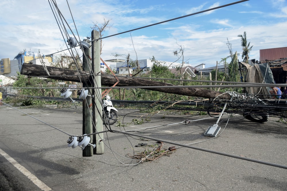 a telephone pole that has been knocked over