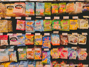 a variety of snacks are on display in a store